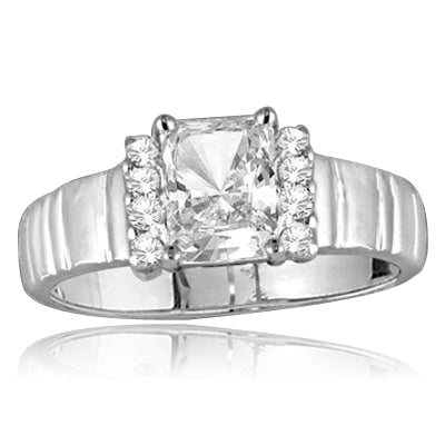 1.25 cts. Radiant Cut Diamond Essence Center with 8 rounds brilliants adorning the sides of an elegant ethnic band set in sterling silver. 1.65 Cts. T.W.