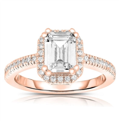Traditional Emerald Essence, 1.75 ct set in eight prongs setting and outlined with Diamond Essence melee. 2.50 cts.t.w. in Rose Plated Sterling Silver.