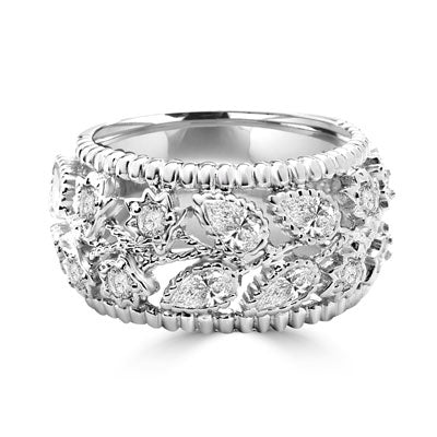 Diamond Essence pear cut and round cut brilliant stones set in Platinum Plated Sterling Silver 'cut work' fashion. 2.4 cts.t.w.