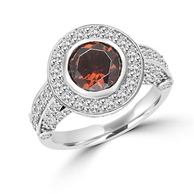 Diamond Essence Designer Ring with 1.5 cts.Chocolate Center, surrounded by small round stones.3.0 cts. tw. in Platinum Plated Sterling Silver.