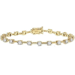 Diamond Essence round brilliants, 0.25 ct. each, set in four prongs setting, and in alternate fashion with bars. 5.25 cts.t.w. in Gold Vermeil.