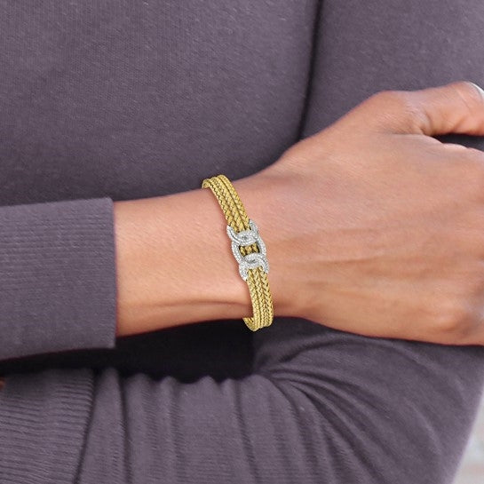 Perfect for every occasion, this woven design gold plated sterling silver cuff bracelet with rhodium plated centerpiece of Diamond Essence round brilliant stones set on a prong setting, 2.5 cts. t.w