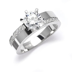 Diamond Essence Ring with 2.0ct. Round brilliant stone set in six prongs with round stones on each side, 2.5cts. T.W. set in 14K Gold Vermeil.