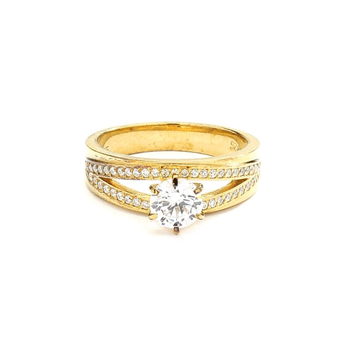 Diamond Essence Ring with 1.0ct. Round brilliant stone set in six prongs with two rows of round stones on each side, 1.20ct. T.W. set in 14K Gold Vermeil.