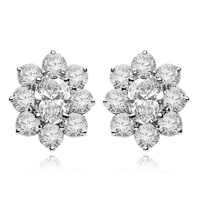 Flower Cluster - Each Earring with 1.0 Cts. Oval Center surrounded by Round Diamond Essence, 4.0 Cts. T.W. set in 14k  Solid White Gold.