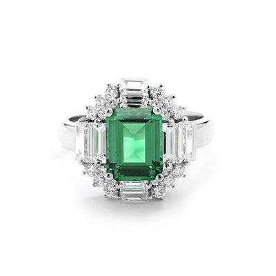 Ring  emerald cut emerald stone, baguettes on 4 sides